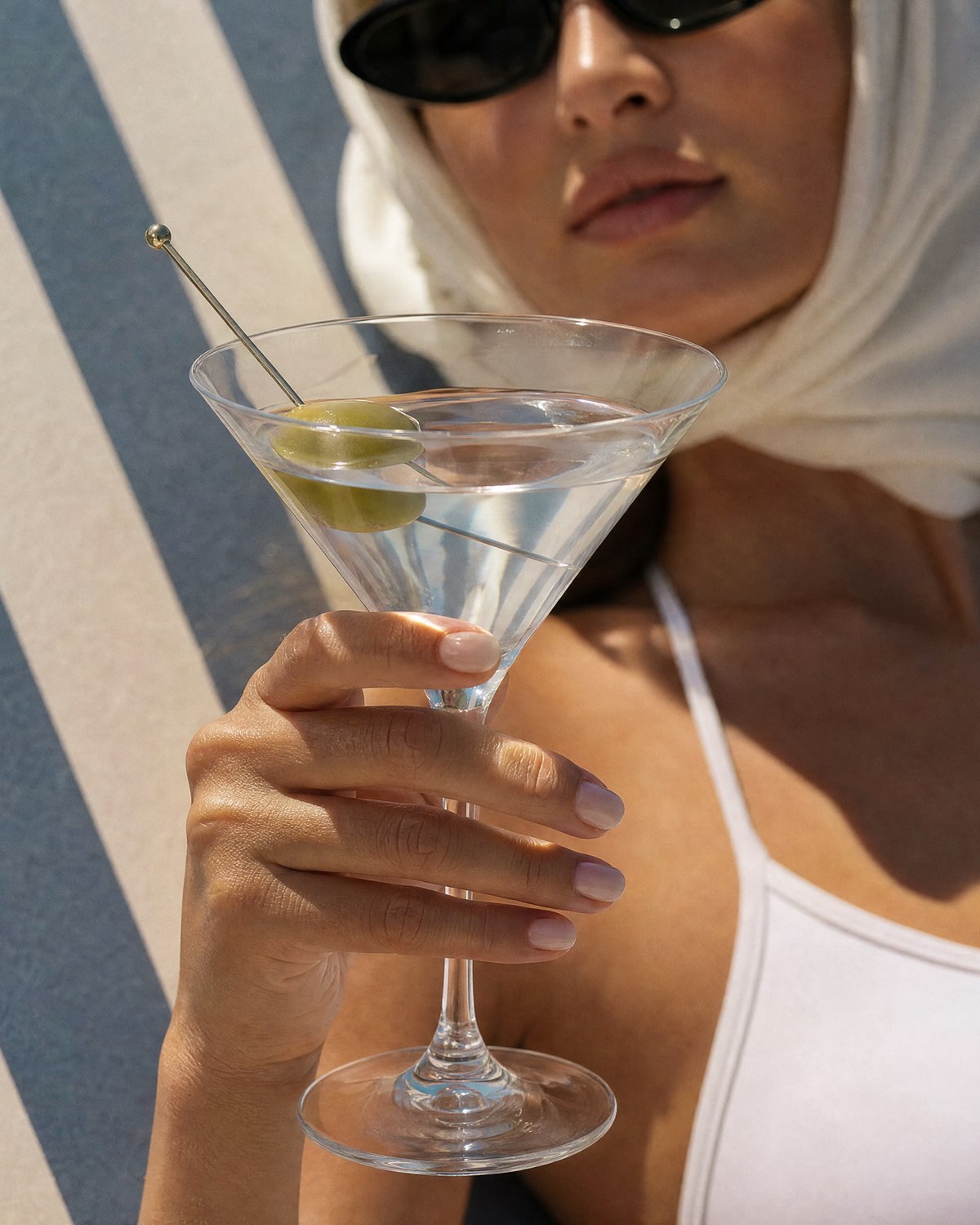 AI-generated editorial — poolside martini